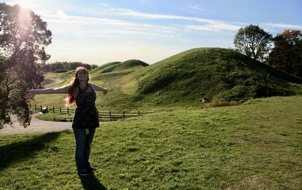 author standing in front of viking burial site